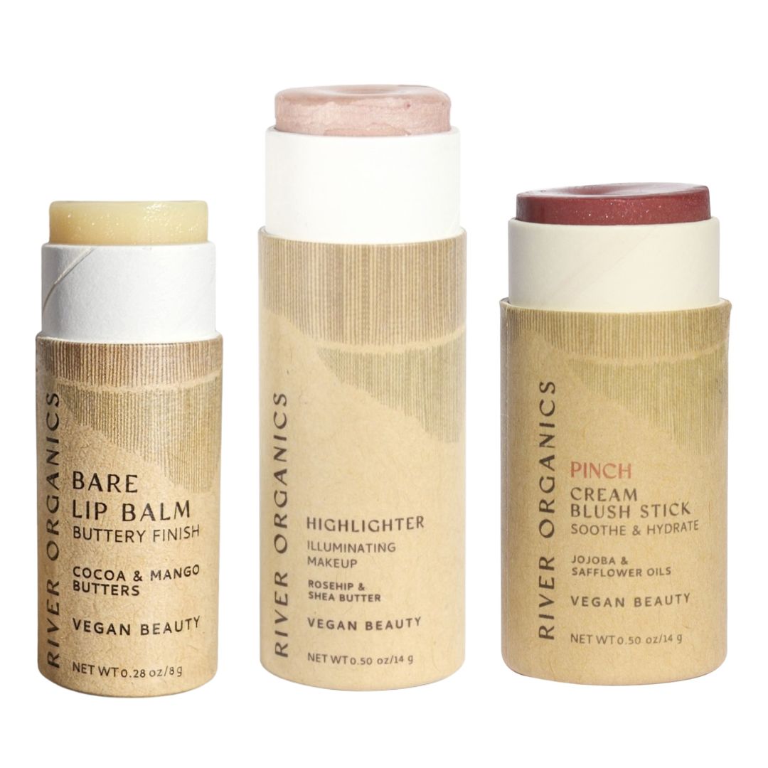 River Organics Lip + Highlighter + Blush Set on a white background, featuring clean beauty, plastic-free packaging with visible labels.