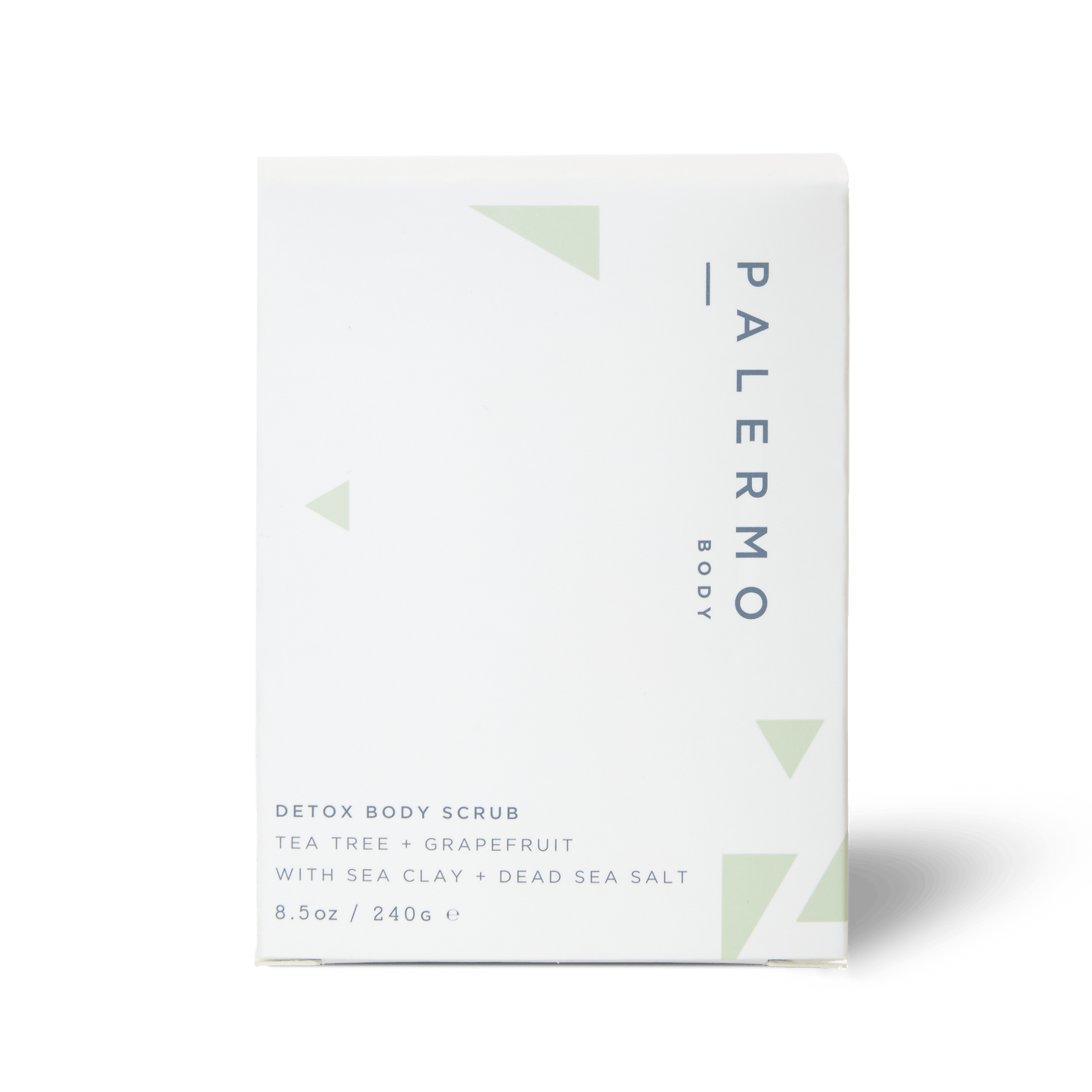 A white box of Palermo Body Detox Body Scrub with minimalist green accents. This 8.5 oz / 240g scrub features tea tree, grapefruit, sea clay, and Dead Sea salt as key ingredients.