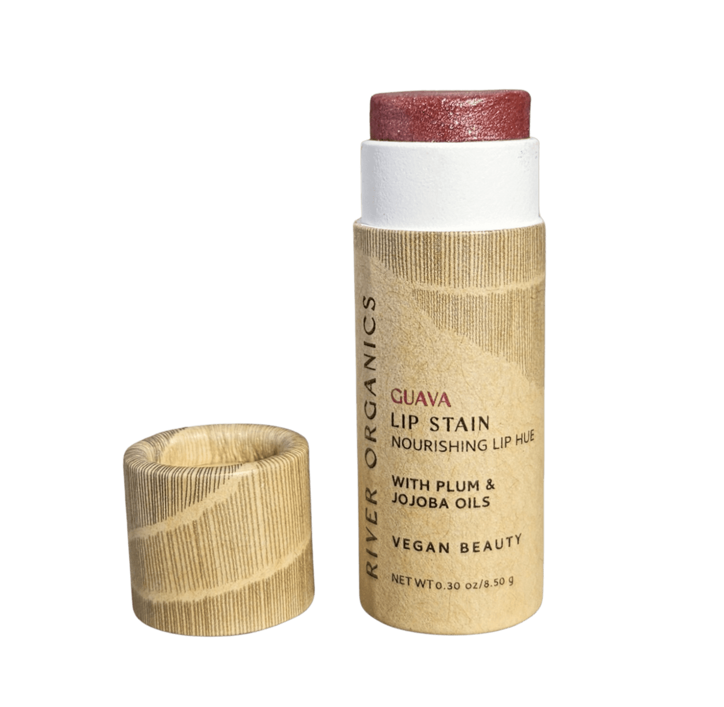 A tube of River Organics Vegan Lip Stains with the cap off reveals the red balm. The plastic-free, eco-friendly packaging highlights plum and jojoba oils among ingredients and notes it's vegan.