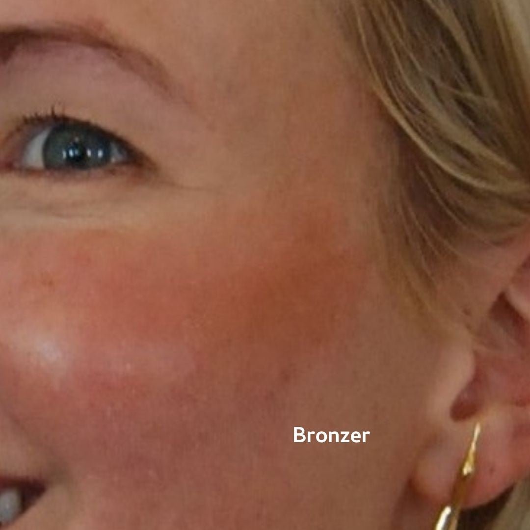 Close-up of a person's face with glowing, bronzed cheeks using River Organics Highlighter and Bronzer Set, labeled "Bronzer," highlighting the radiant effect of non-toxic cosmetics.