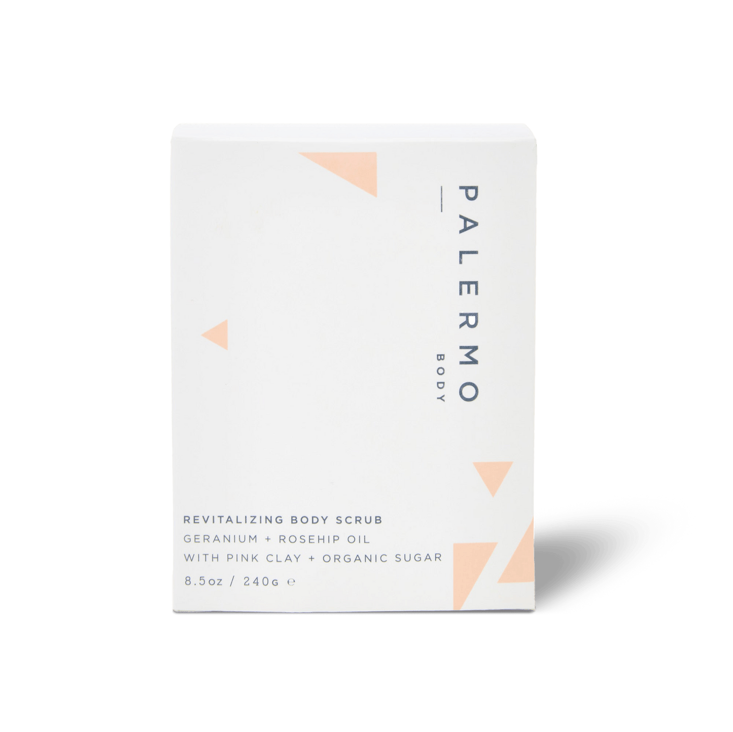 A white box of Palermo Body Revitalizing Body Scrub with geometric peach accents features aromatherapeutic geranium, rosehip oil, French pink clay, organic sugar, and lists the weight as 8.5 oz / 240 g.