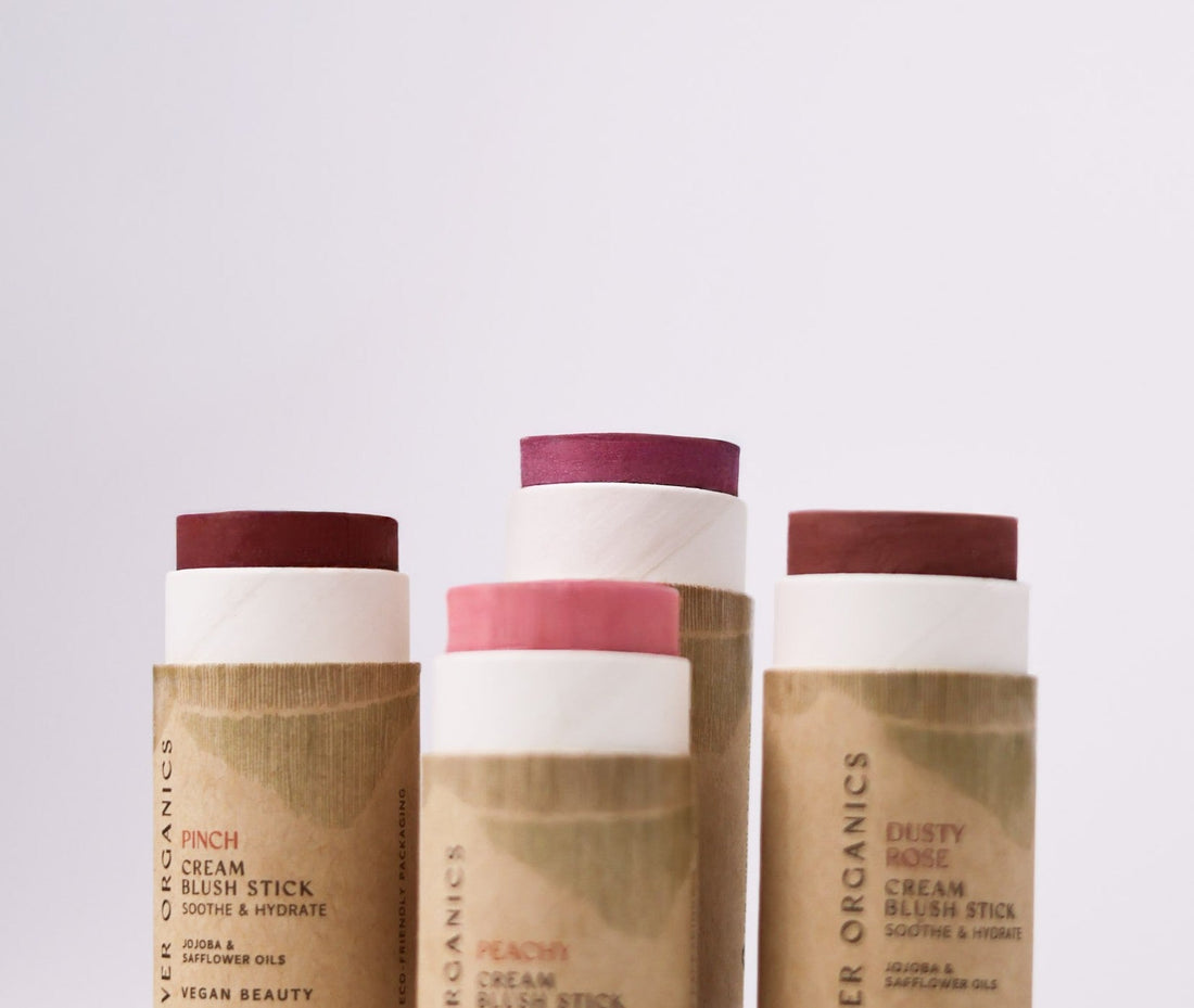 River Organics cream blush sticks in four shades in plastic-free paper tubes