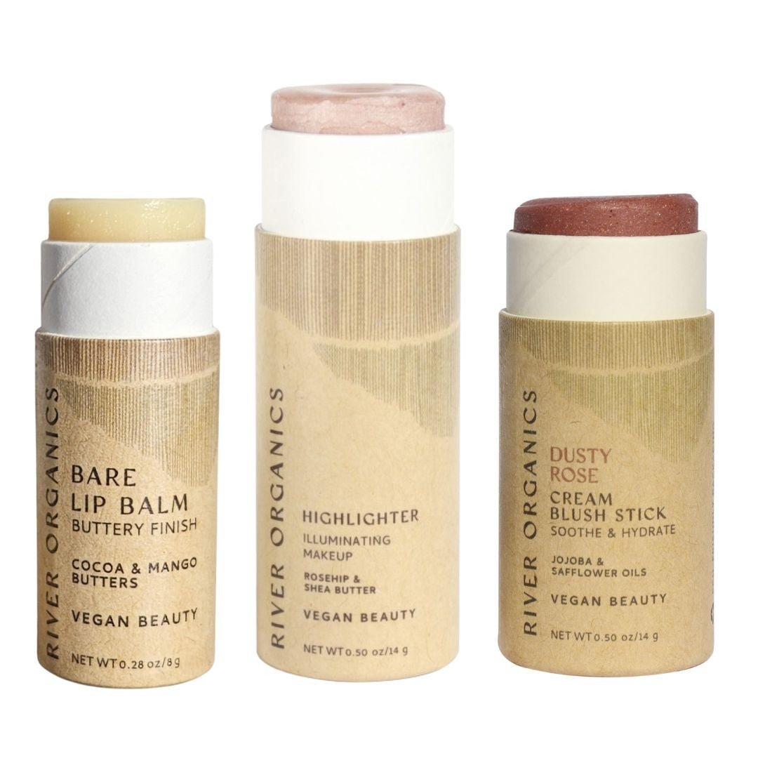 The River Organics Lip + Highlighter + Blush Set features three vegan beauty sticks in eco-friendly, plastic-free packaging with labeled tubes—ideal for a clean beauty routine.