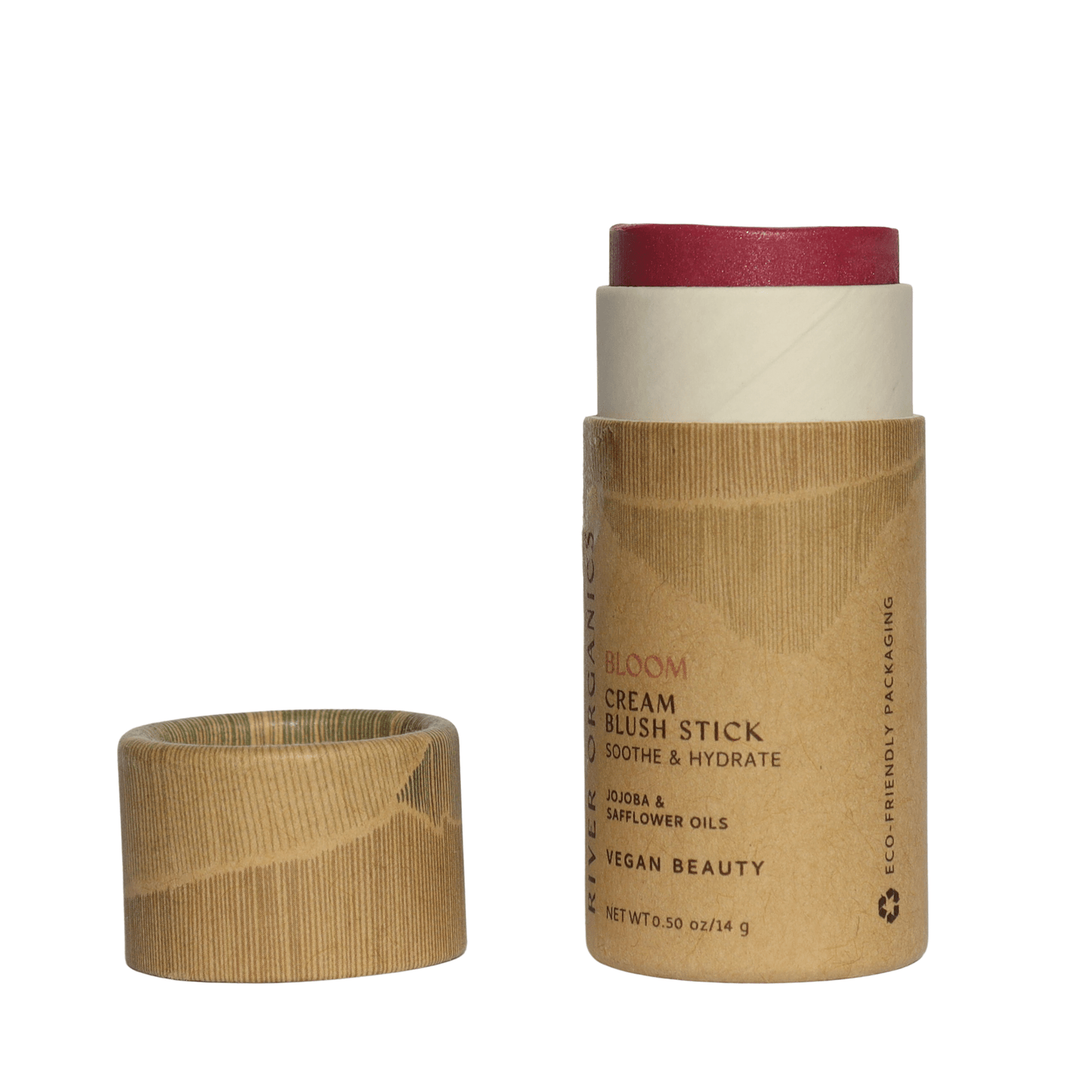 A tube of River Organics Natural Cream Blush Stick with a reddish-pink tip, shown without its lid. Housed in plastic-free packaging, the vegan blush features hydrating oils and a zero-waste formula for eco-friendly beauty.