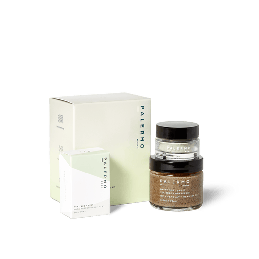 The Palermo Body Detox + Clarify Mindful Kit includes tea tree soap, a white box item, and a clear jar of Coffee Detox Body Scrub—perfect additions to your self-care routine.