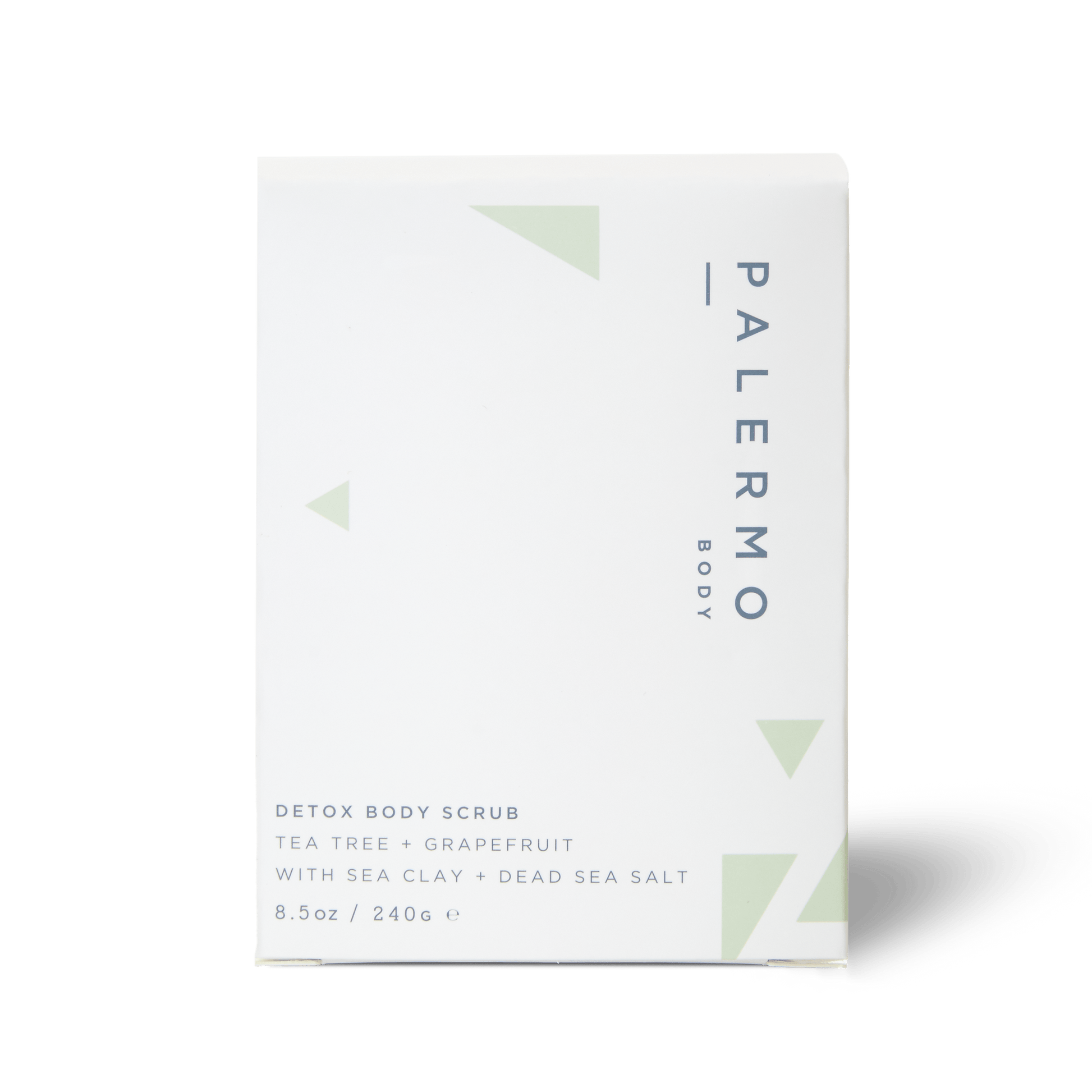 A white box of Palermo Body Detox Body Scrub with minimalist green accents. This 8.5 oz / 240g scrub features tea tree, grapefruit, sea clay, and Dead Sea salt as key ingredients.