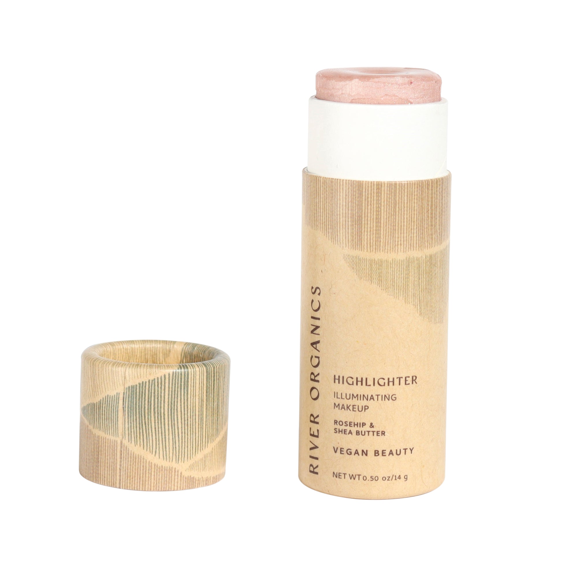 A beige cardboard tube of River Organics Rose Quartz Vegan Highlighter Stick with the cap off reveals a light pink product. The label highlights rosehip, shea butter, and its vegan formula, making it an ideal choice for vegan beauty enthusiasts.