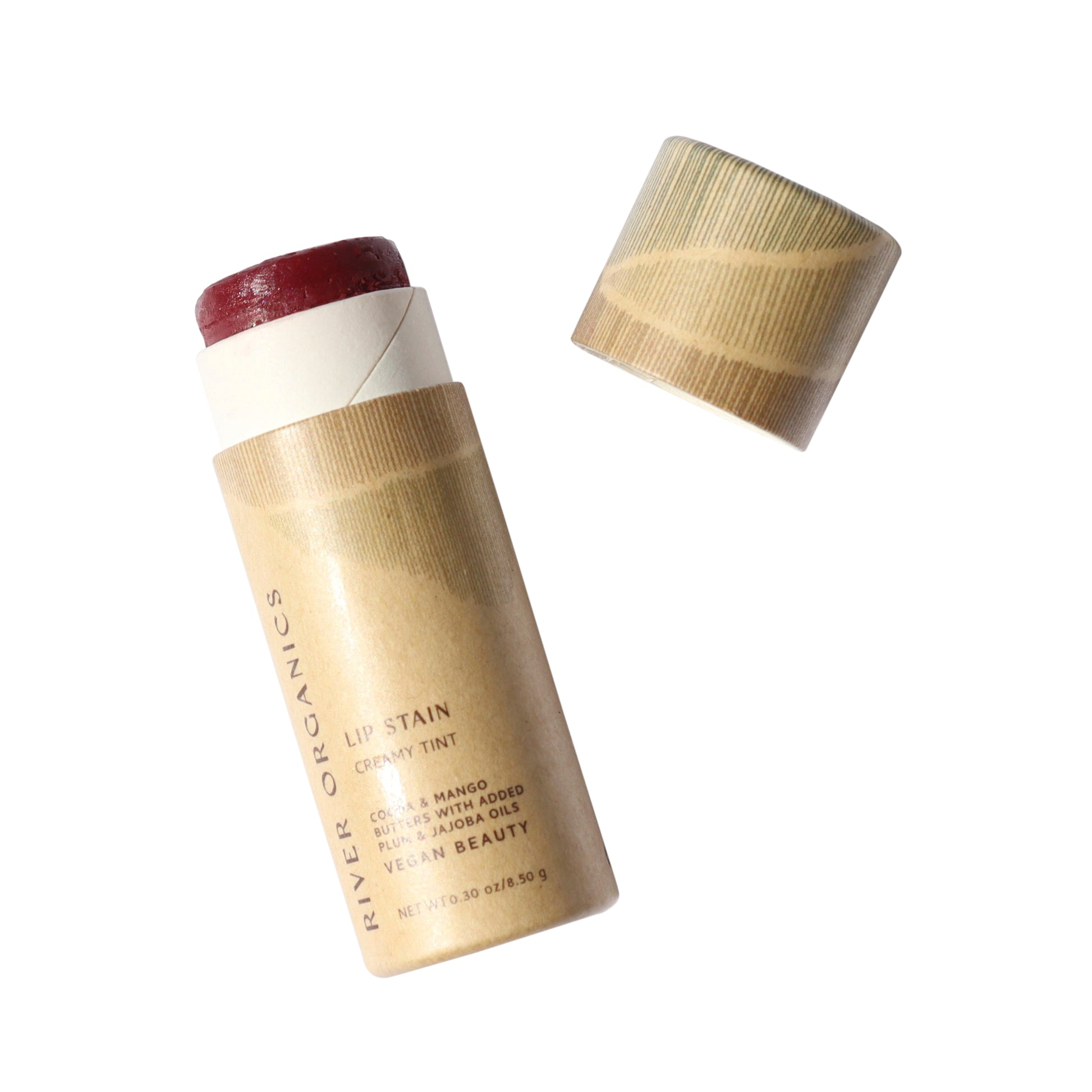 The River Organics Vegan Lip Stain - Fig comes in zero-waste, eco-friendly brown cardboard packaging. Remove the cap to reveal the hydrating dark red formula inside.