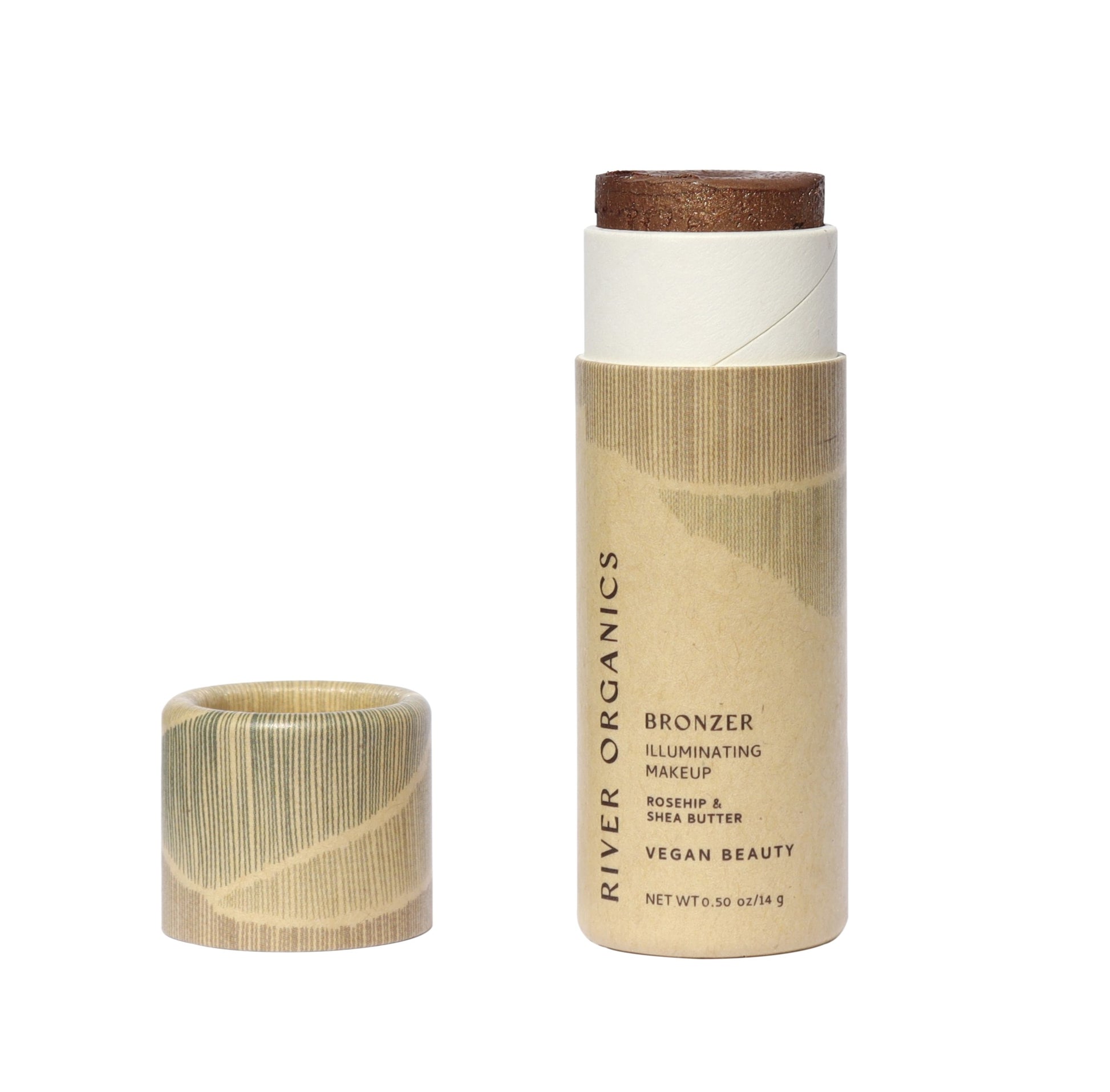 River Organics' Shimmery Face and Body Bronzer Stick is presented in a beige eco-friendly tube. The cap is off, revealing the bronzer's illuminating makeup featuring vegan ingredients like rosehip and shea butter, with a net weight of 0.5 oz.