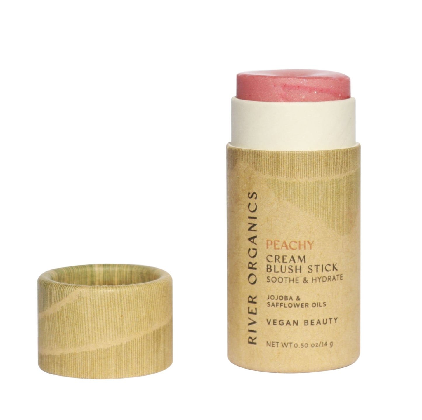 A River Organics Natural Cream Blush Stick with the cap off shows pink blush. The light brown tube has minimalist labeling and promotes its vegan formula, plastic-free packaging, and nourishing jojoba and safflower oils.