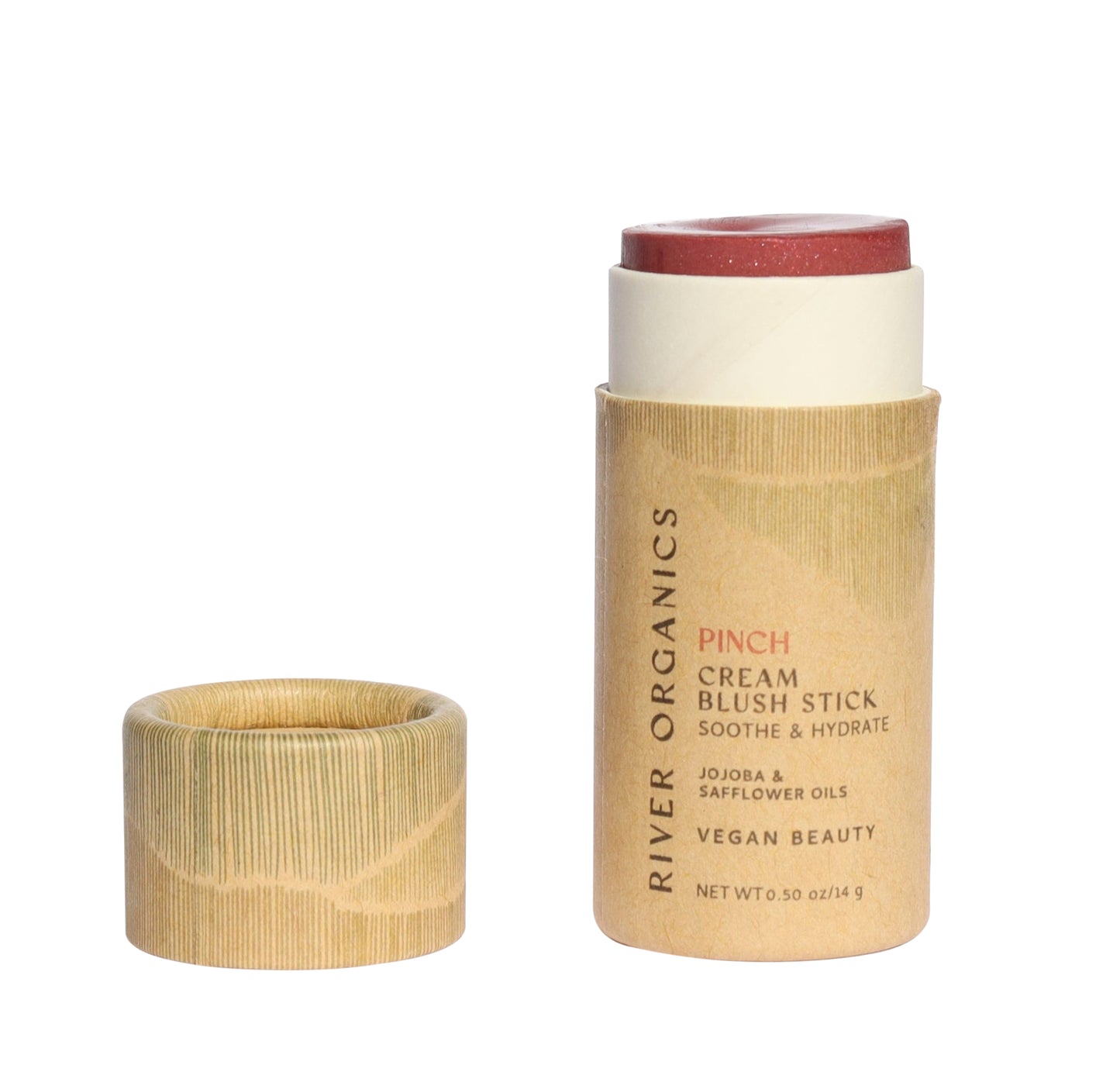 A River Organics Natural Cream Blush Stick, cap off to reveal the rosy-pink blush. The eco-friendly, plastic-free tube displays text about vegan beauty and nourishing natural oils in this zero-waste formula.