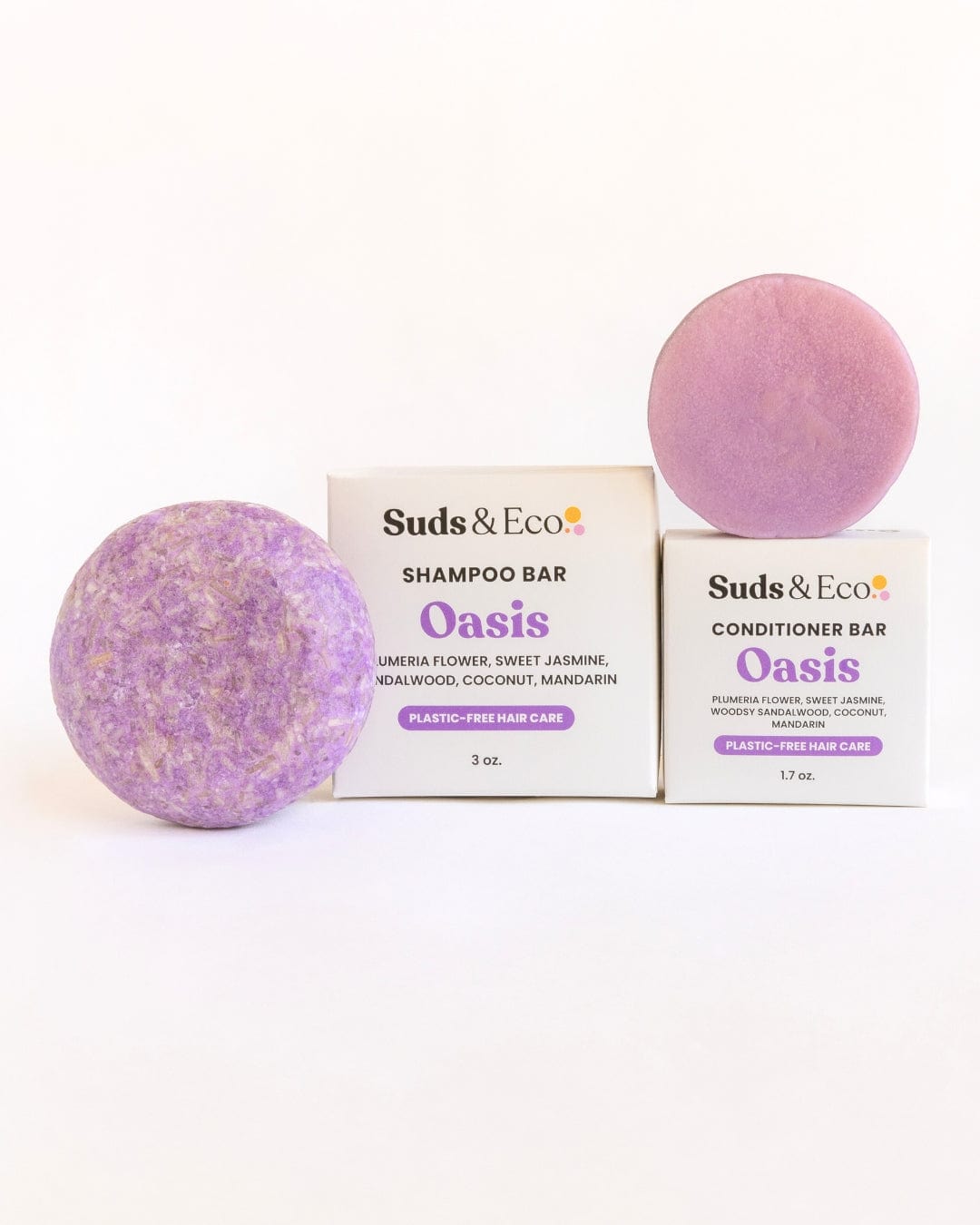 Two purple Shampoo & Conditioner Bar Duo bars from ZeroWasteStore.com, shown with labeled Oasis boxes on a white background, offer an eco-friendly, zero waste solution for your hair care routine.