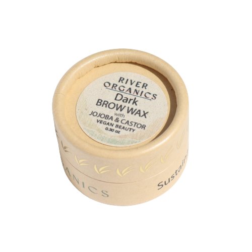 A small beige cylindrical container with a round lid, labeled "River Organics Tinted Vegan Eyebrow Wax | Dark" in black text. The vegan brow wax packaging indicates the product is natural and has a net weight of 0.30 oz.